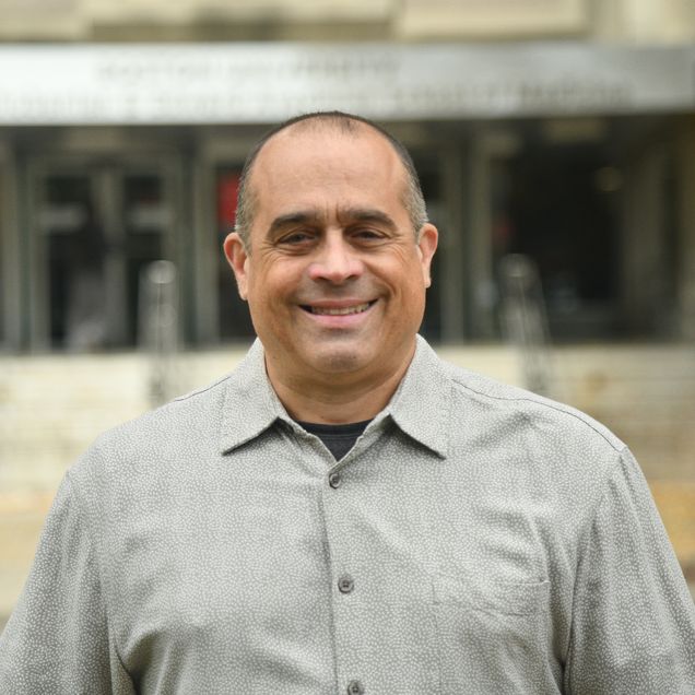 Scott Harris head and shoulders shot outside of Instructional building