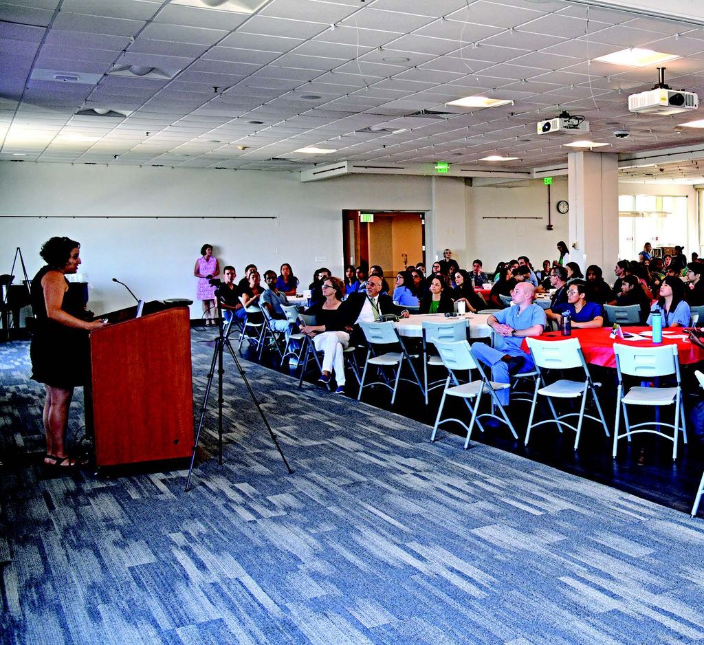 Assistant Dean of Medical Education for
Curriculum Molly Cohen-Osher, MD, addresses
students gathered for the Stanfield Lecture.