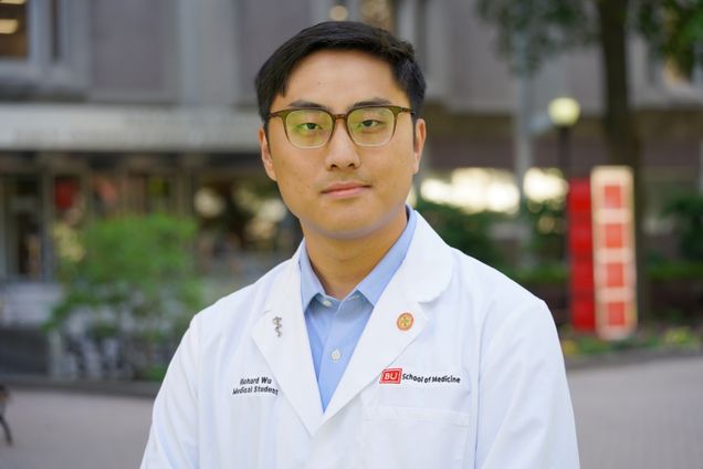 Head and shoulders shot of Richard Wu in his whitecoat