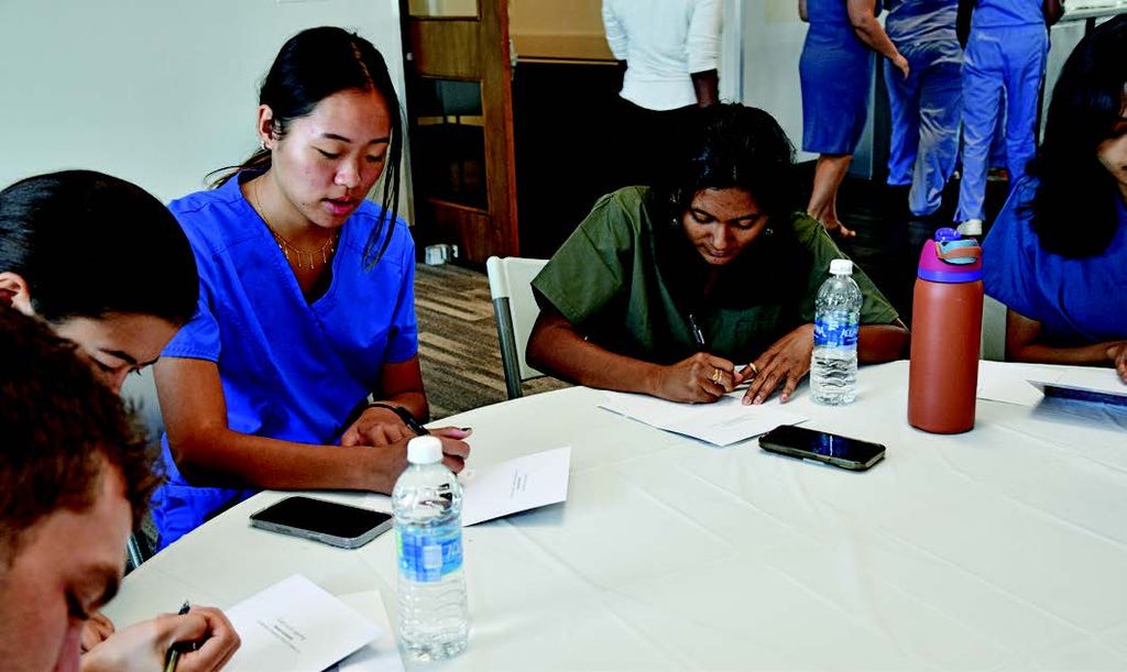 Medical students write thank-you notes to alumni for their generous donations of stethoscopes.