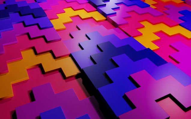 Photo by BoliviaInteligente on Unsplash. brightly colored pink, blue, purple, gold puzzle pieces fitting together
