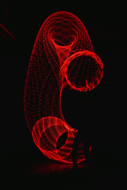 3D image of red heart on black background Photo by Zach Lucero on Unsplash