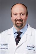 Head and shoulders of Chad Farris in whitecoat