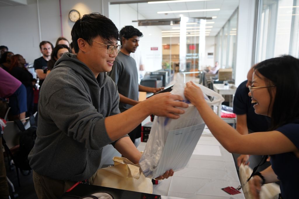 Student receiving his medical equipment