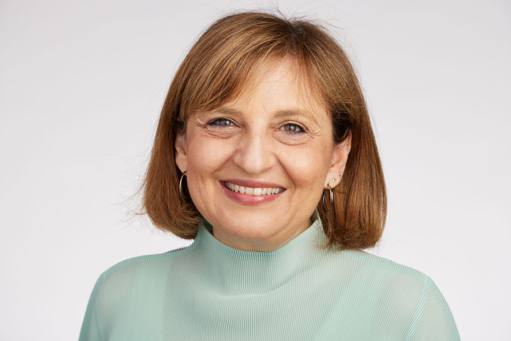 headshot of Dr. Zachariou wearing green sweater