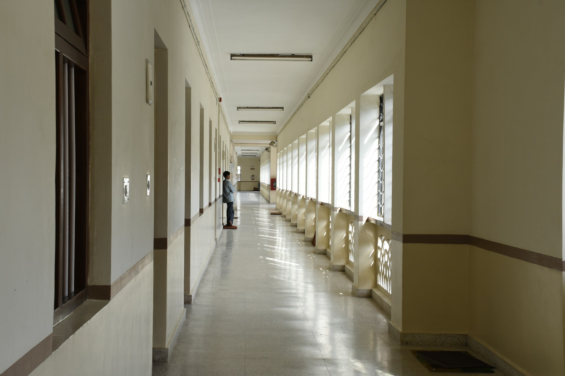 Hallway with windows and doorways