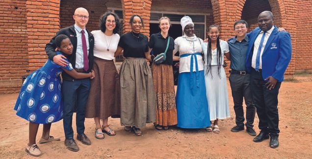 A group of students standing in Malawi