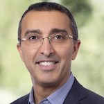 Headshot of Omid Farokhzad glasses, smiling
