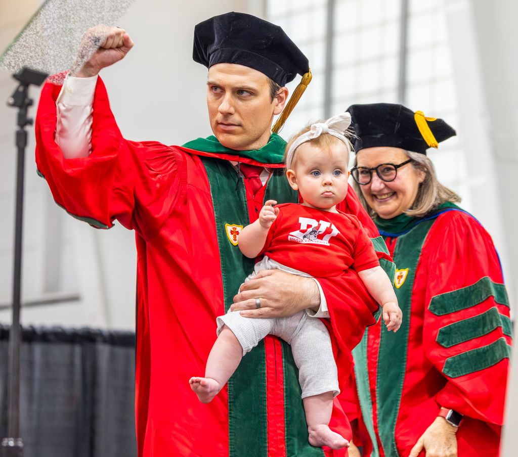 Man, baby, faculty immediately after hooding