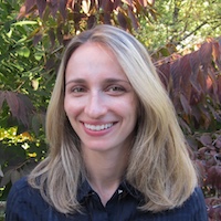 Woman with shoulder length blond hair smiling