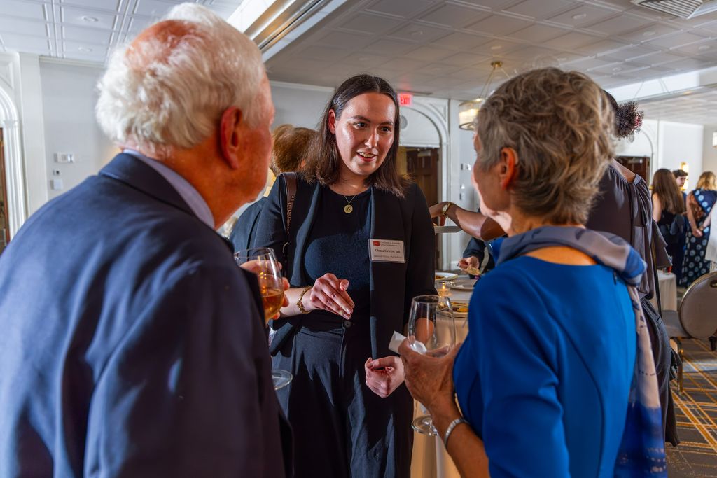 Woman and man talking with younger woman