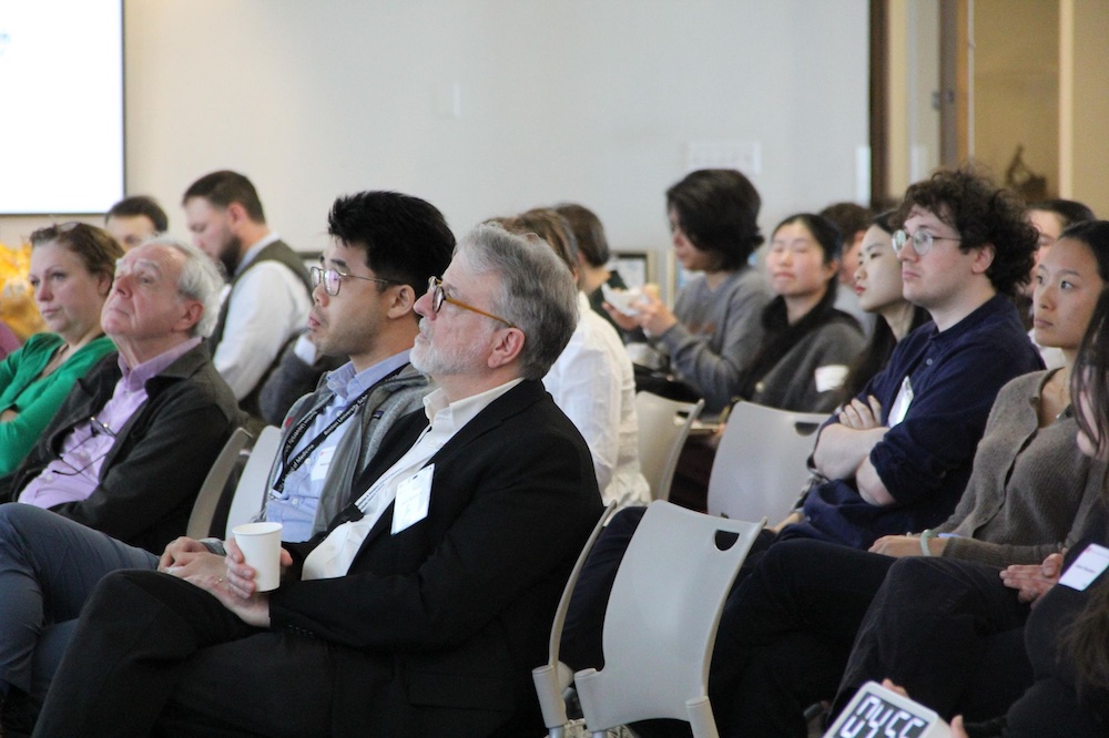 A full house at the GMS Research Symposium, including Associate Dean C. James McKnight, PhD, MA, center, hears award winners present their research.