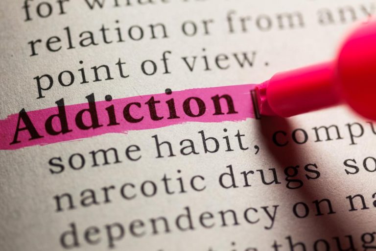 The word "Addiction" highlighted with pink marker
