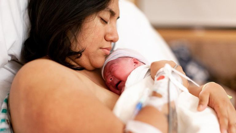 Mother holding a newborn baby