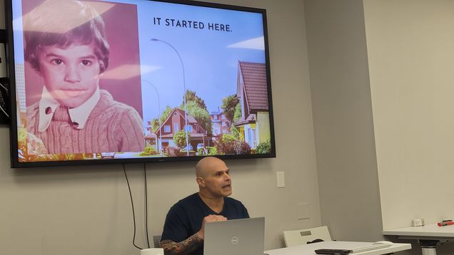 Guy Felicella presenting to Scholars