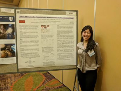 Judy Cheng, MD, with her poster "Effect of Stimuli on Sun Protective Habits: A Randomized Double-Blind Controlled Study"