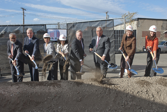 10-2903-BUSMDORM-059 At the MED Student Residence groundbreaking October 28: (from left) Ashraf Dahod; Joe Fallon; Sherry Leventhal; Shamim Dahod (CGS’76, CAS’78, MED’87); President Robert A. Brown; Mayor Thomas Menino; MED Dean Karen Antman; and Catherine Spina (CAS’04, MED’05,’15). Photo by Vernon Doucette