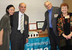 TranSComm Celebration cutting the cake sized Cutting the cake!