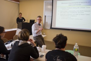 Alexander Walley with public health workers who are participating in the Massachusetts Department of Public Health's Opioid Overdose Prevention Pilot Porgram, which provides overdose prevention education and distributes naloxone rescue kits to people likely to witness an overdose. Photo by Cydney Scott