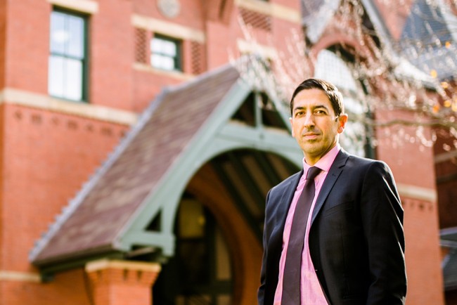 Dean Sandro Galea in front of the Talbot Building, home of the BU School of Public Health, which kicks off its 40th anniversary celebration this month. Photo by Dan Aguirre