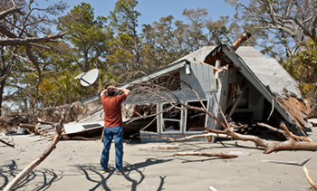 COM SPH man-in-front-of-house-destroyed-by-storm