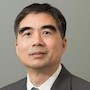 Head and shoulders shot of Huiping Zhang
