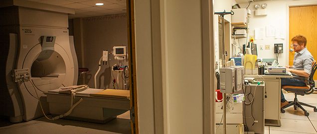 Student using MRI scanner