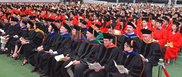 group of faculty and students at graduation