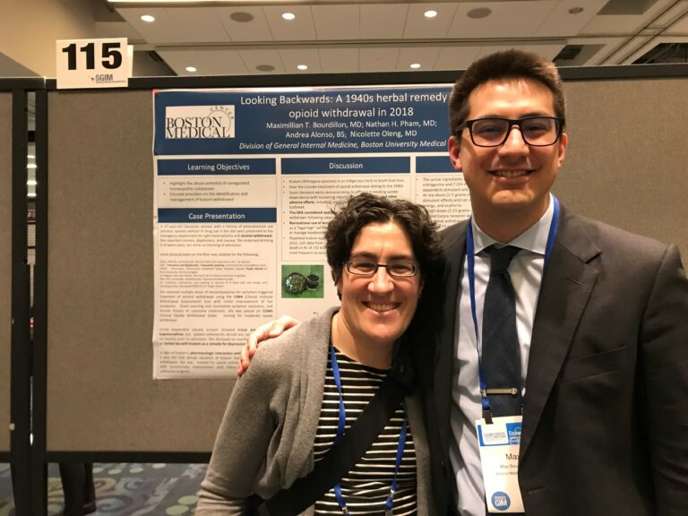 Dr. Siegel with resident in front of poster