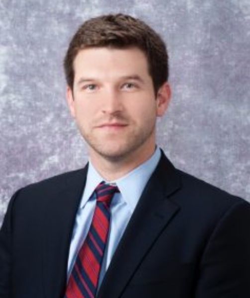 headshot of Ryan W. Logan