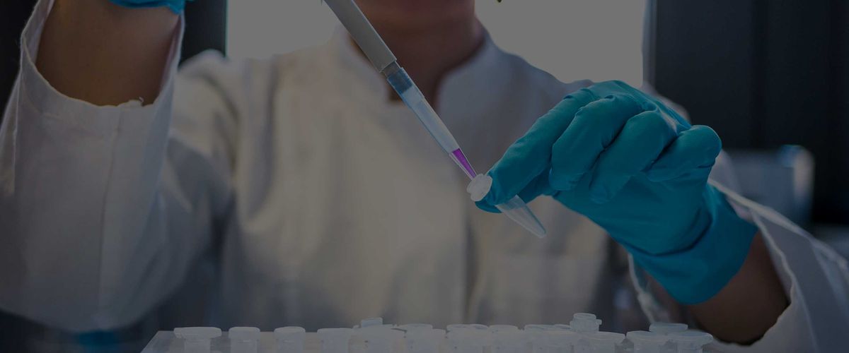 Researcher filling vials