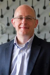 Headshot of Joseph Mizgerd